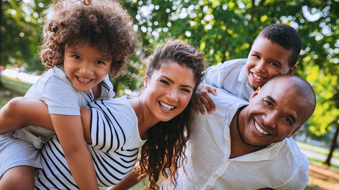 Smiling Family Outdoors