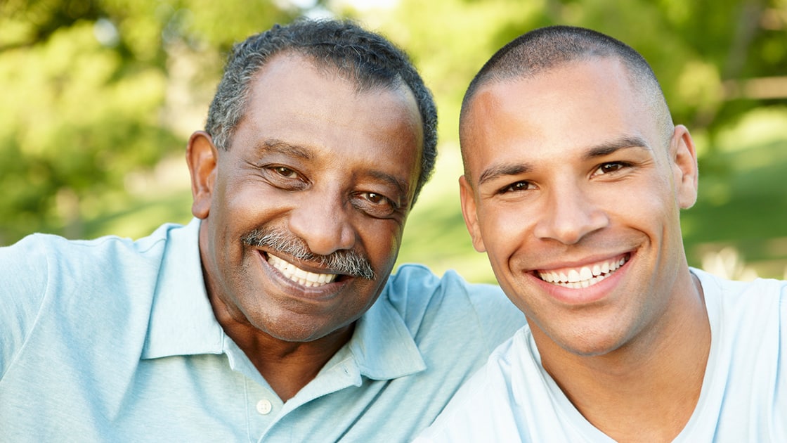 Smling African American Father and Son Photo