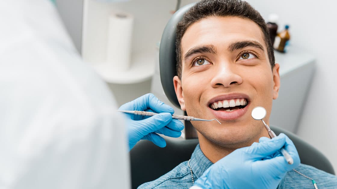 young man in dental chair