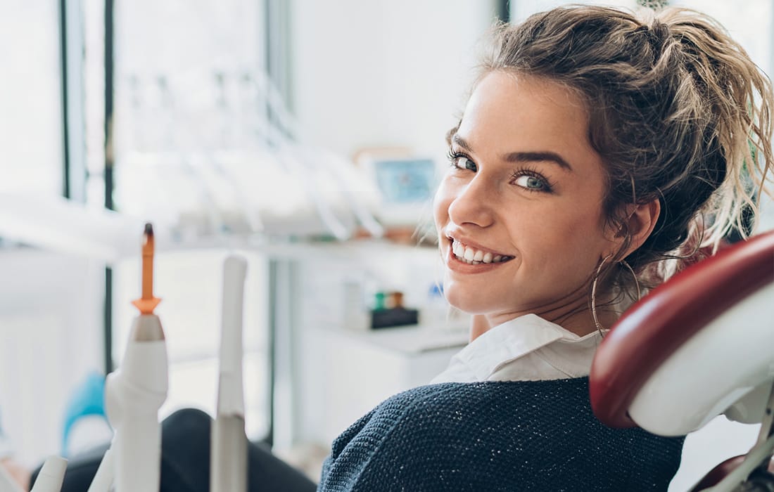 Relaxed Patient Sitting in Dental Chair Photo